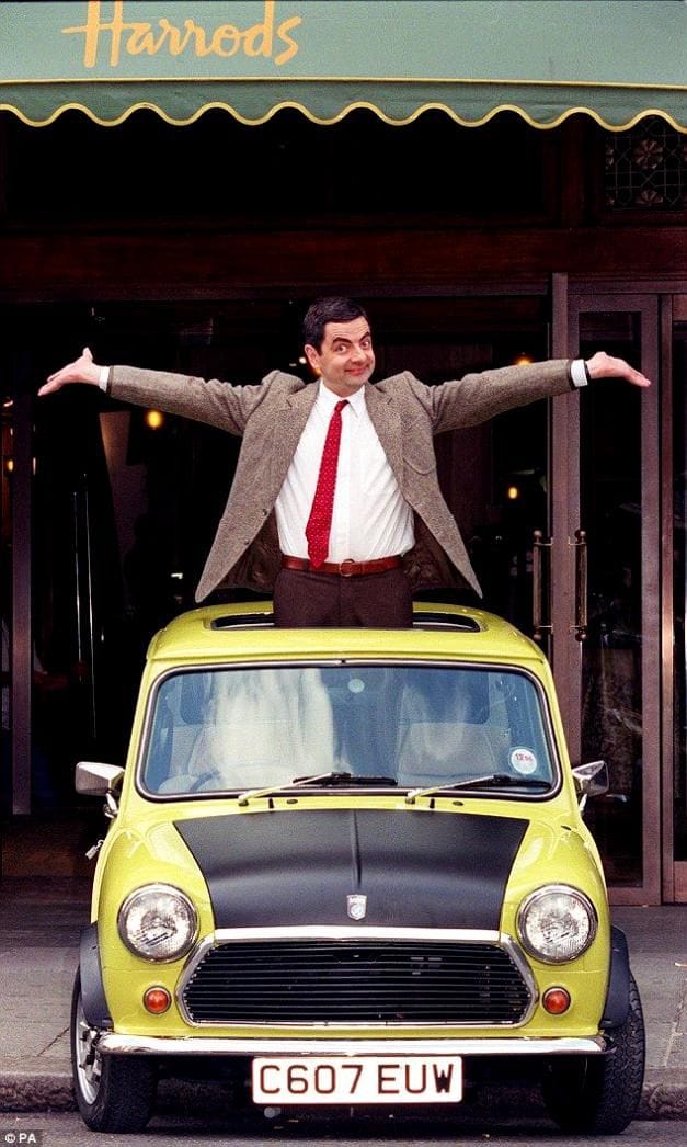 Mr Bean heads to Buckingham Palace atop his iconic lime green Mini