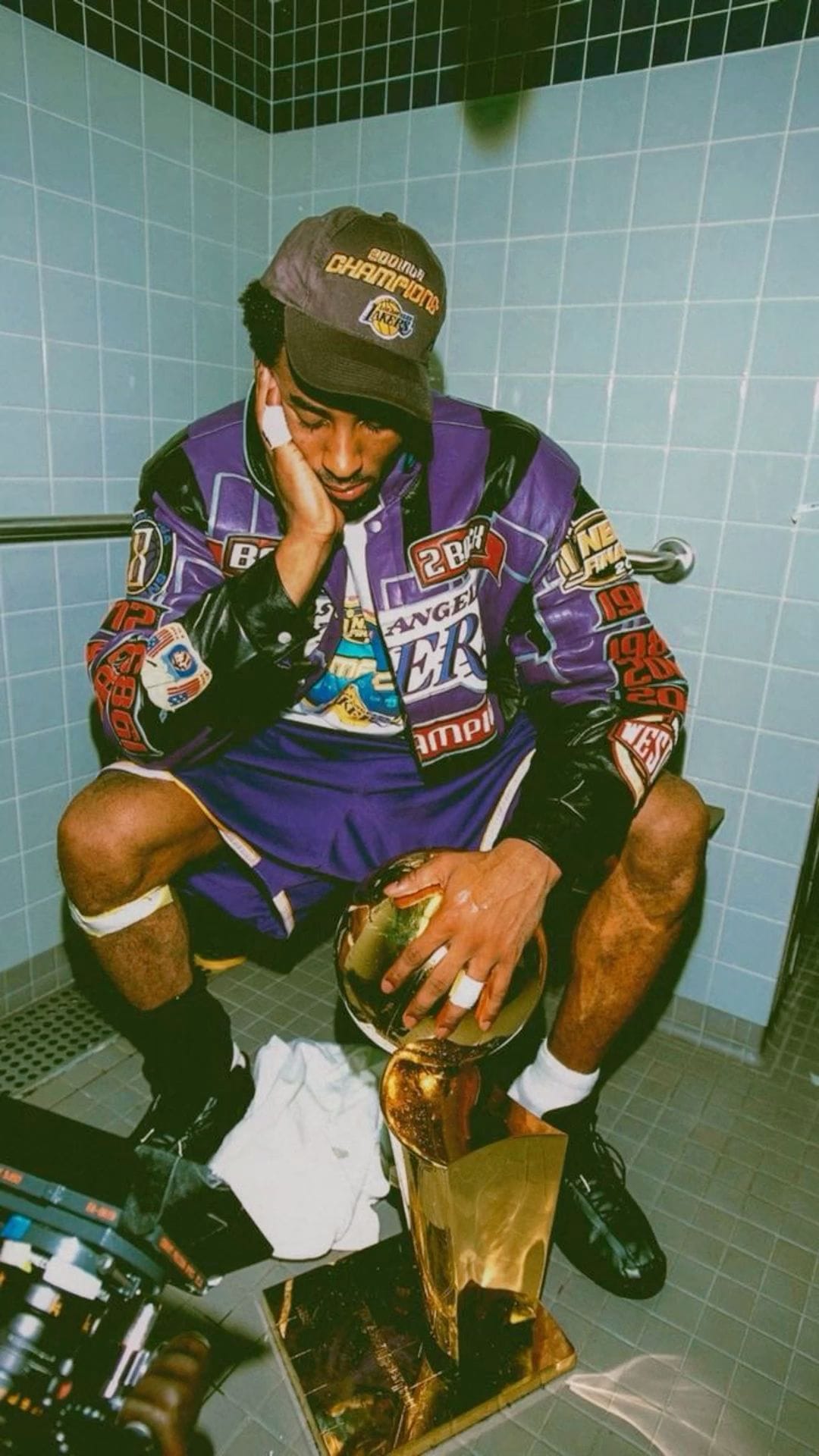 Kobe Bryant With NBA Trophy